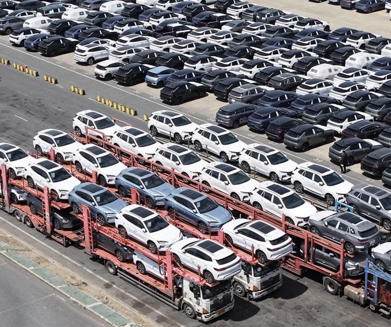 Auction-purchased vehicles staged for carrier pickup